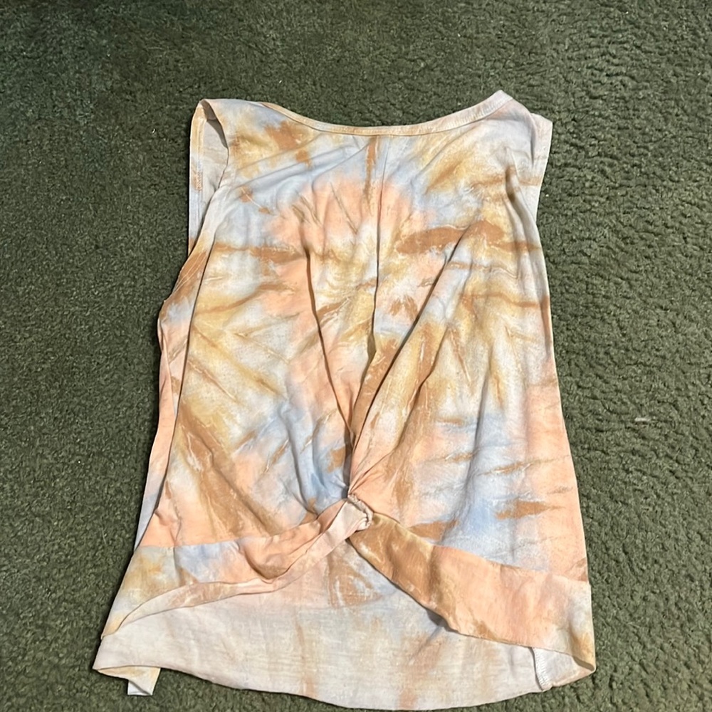 Women’s Tank Top. Barely worn. No stains. There’s a knot in the front.